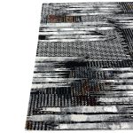 Upgrade your space instantly with our premium Turkish machine-made rugs, designed for modern living. These rugs feature a mix of contemporary, abstract, and geometric designs, making them perfect for both classic and modern interiors. Crafted in Turkey using high-quality materials, they offer a soft feel underfoot while remaining highly durable and easy to maintain. The low to medium pile makes them ideal for high-traffic areas like lounges, dining rooms, and bedrooms. With stylish color combinations ranging from neutral tones to bold statement pieces, these rugs are designed to complement any décor while adding warmth and character to your home. Perfect for everyday use, these rugs are stain-resistant, easy to clean, and built to last — giving you luxury looks without the high maintenance. Size CM: 230 x 160cm Primary Color Is Black Pile Material: 100% Polyester Made in: Turkey Has No Fringes Note to Customers: Carefully measure your space before purchasing to ensure the rug fits your desired area. Colors may slightly vary due to lighting and monitor settings.